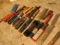 assorted size end mills in protective tubes