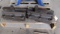 pair adjustable jaws typically used for large lathe face plates or vertical mills