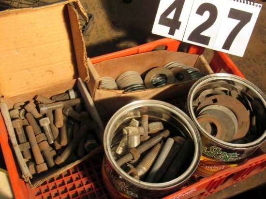 assorted large flat washers and cap screws