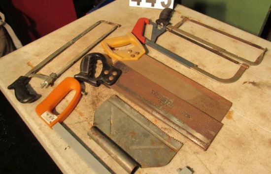 assorted hack saws, and miter saw