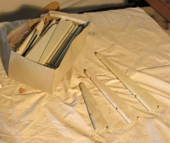 box of 24 white shelf support brackets for slotted channel