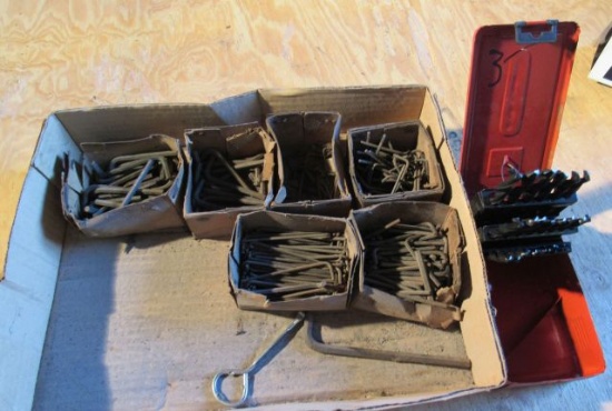 large assortment of allen wrenches and a drill index