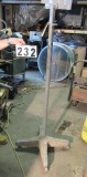 light or fan stand on casters