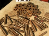 assorted threading dies and mixed taps