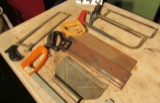 assorted hack saws, and miter saw