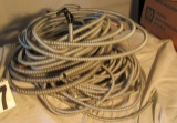 barrel of mixed length flex conduit with 3 wire