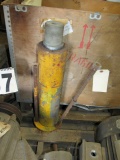 hydraulic piston with solid shaft ram for machine