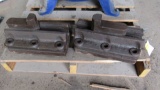 pair adjustable jaws typically used for large lathe face plates or vertical mills