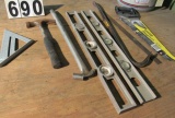 mixed tools, hammer, levels, marking square, tubing bender