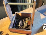 Homemade wood tool caddy with mixed tools ;including Stanley plane, leather tool holsters, sawblades