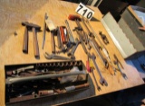tool box of pullers, hammers, punches