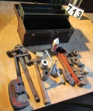 metal tool box with plumbing tools - solder, Rigid pipe wrenches, pipe cutter