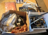 box lot of shelving brackets, door knocks, shower head, and more