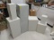 group of 11 mixed size white display pedestals in great condition
