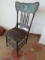 antique leather-bottomed wood chair