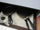 mixed cookware, pots and pans, frying pans