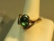 14K - yg- oval green tourmaline ring size 8 1/2, with 2 dia @2. weight 15.4 g