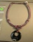 Mauve silk corded necklace w/banded agate donut - adjustable length