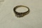 10K -yg- ring w/9 white quartz stones (possible diamonds???)  (estate jewelry)