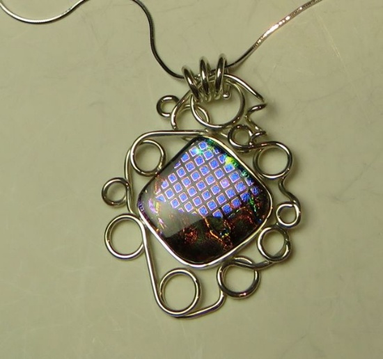 Dichroic surrounded by S curved sterling on 22" sterling chain