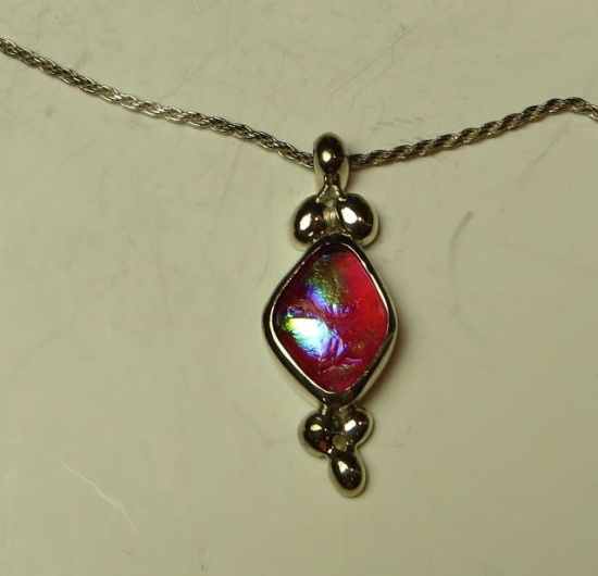 Dichroic glass framed in sterling on 16" sterling chain