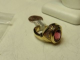 14K yellow gold pink tourmaline ring with (5) 1.5 dia & (4) 2. dia ring size 8 1/4, weight 17.6 g