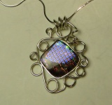 Dichroic surrounded by S curved sterling on 22