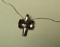 Sterling angel cross w/garnet on 18