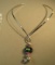 Sterling pendant w/dichoric glass & 4 silver beads on neck wire