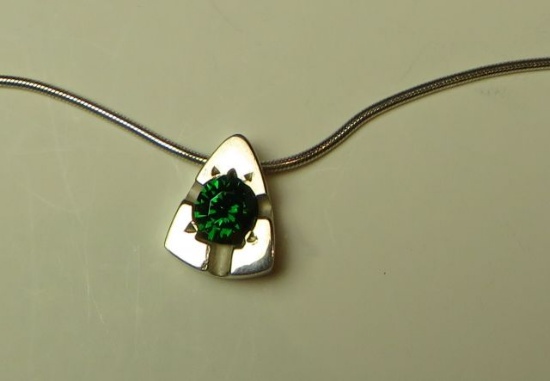 Sterling triangular pendant w/green c.z. on 24" sterling snake chain