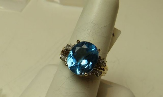 10K -yg- oval Helenite ring, size 7 1/2, weight 4.0, with 12 cubic zirconia