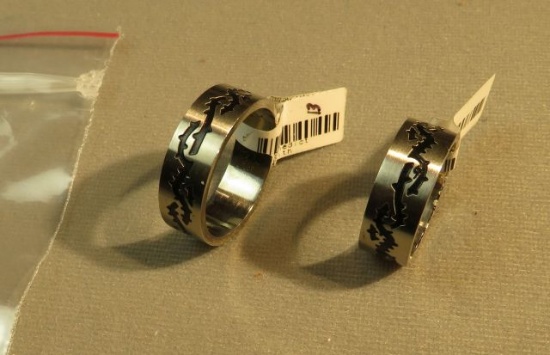 2 Stainless Steel rings with black pattern 1- @68 size 13, 1- @60 size 9 1/4