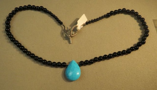 18" necklace Black onyx with 2 sterling waves & turquoise teardrop stone, toggle clasp