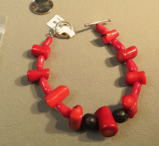 7 1/2" bracelet - enhanced coral & lava beads w/sterling toggle clasp