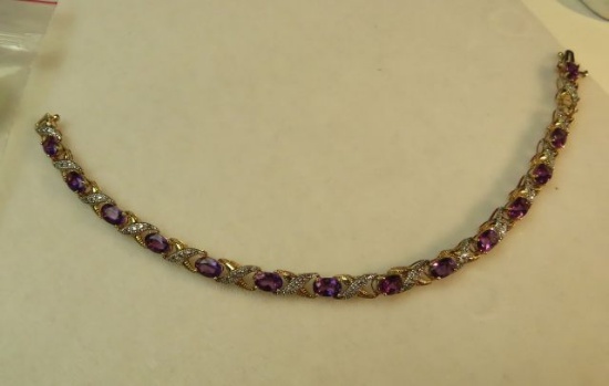 14K -yg- 7 1/2" bracelet w/13 amethysts (one missing) (estate jewelry)