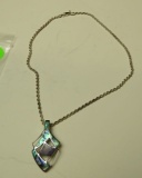 Abalone slider in sterling setting on 16