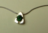 Sterling triangular pendant w/green c.z. on 24