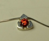 Sterling triangular pendant w/red orange c.z. on 16