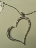 Silver tone heart pendant on adjustable 16