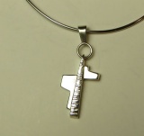 Sterling cross on neck wire