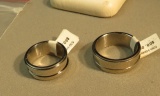 2 Stainless Steel rings with levels 1- @60 size 8 1/2, 1- @68 size 12