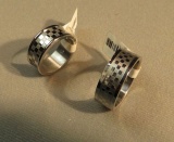 2 Stainless Steel rings with checked pattern1- @50 size 6, 1- @60 size 9