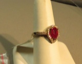 14K - yg over sterling ring with lab ruby - pear shaped size 7 1/2