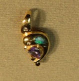 14K -yg- dolphin pendant with diamond eye, diamond bell, tanzanite & lab opal