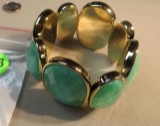 stretchy green/yellow stones in goldtone bezels