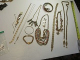 6 necklaces, 5 bracelets, 1 chain belt,