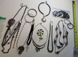 mixed necklaces, bracelets, pins