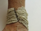 multi strand ivory/ecru white beaded stretch bracelet