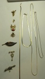 4 brooches, 4 pins, 4 flat chain necklaces