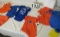 mixed size and color baby onesies with licensed U of F logos